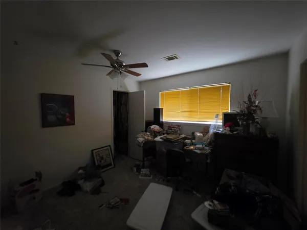 a room with furniture and a window