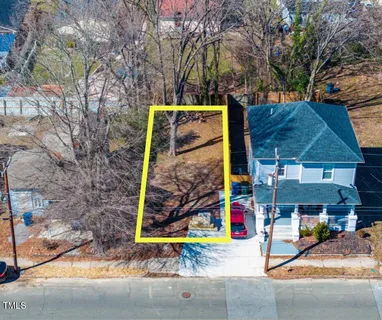 an outdoor space with patio and sitting area