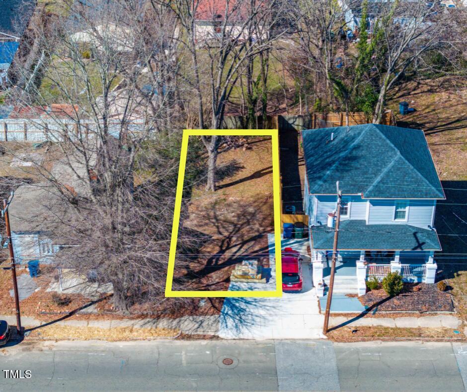 822 Kent Street Durham, NC 27701 - Photo 1 of 4 an outdoor space with patio and sitting area