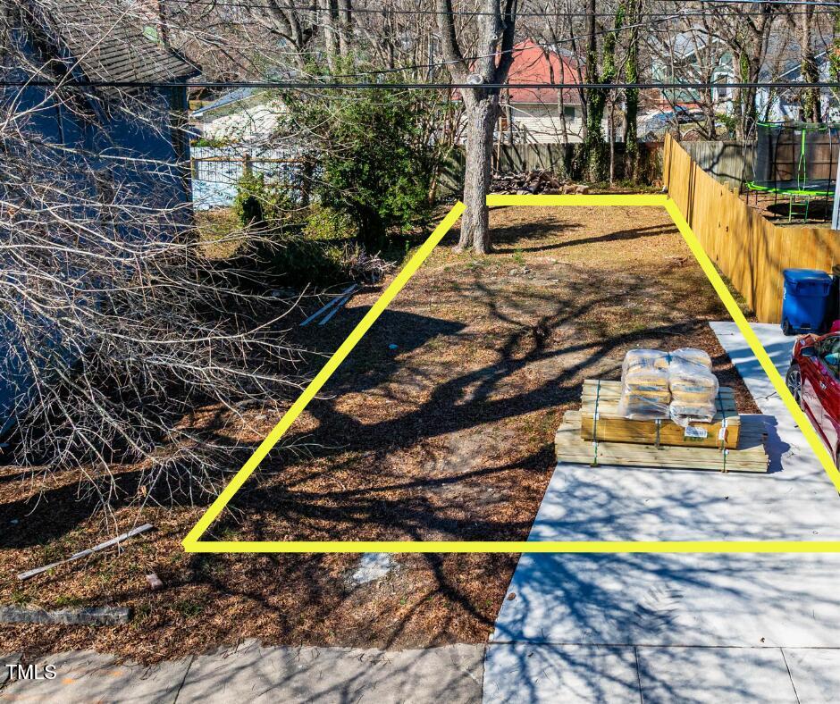 822 Kent Street Durham, NC 27701 - Photo 2 of 4 a view of swimming pool with sitting area and slide