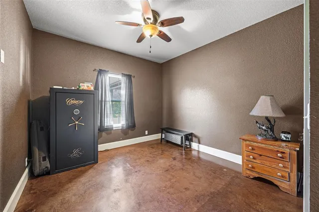 a view of workspace with furniture and lamp