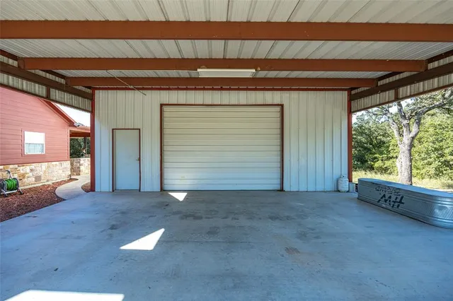 a view of a room with a large window