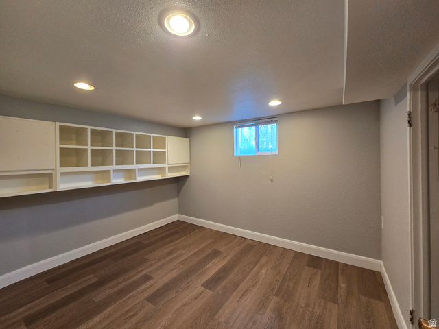 490 Averett Avenue, Unit 1 Springville, UT 84663 - Photo 9 of 11 Below grade area featuring dark wood finished floors, a textured ceiling, and recessed lighting