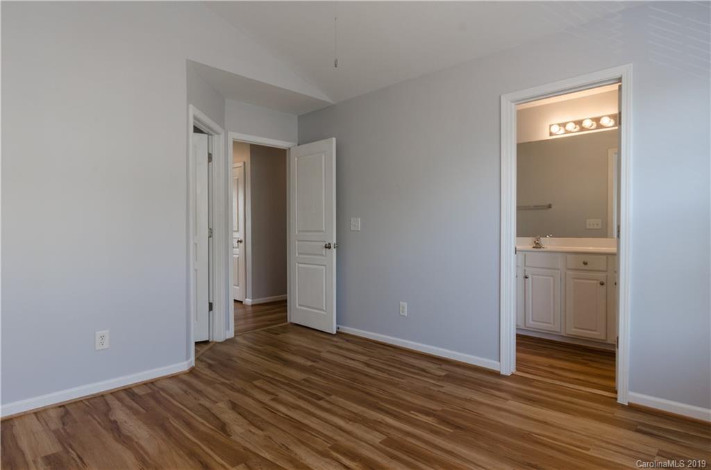 962 Copperstone Lane Fort Mill, SC 29708 - Photo 22 of 34 a view of a room with wooden floor and bathroom