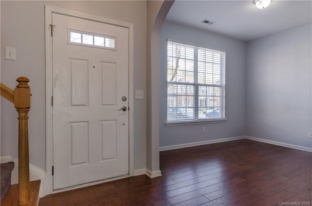 962 Copperstone Lane Fort Mill, SC 29708 - Photo 4 of 34 an empty room with wooden floor closet and windows