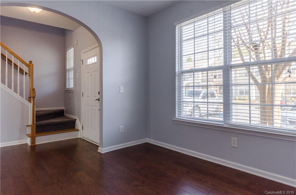 962 Copperstone Lane Fort Mill, SC 29708 - Photo 5 of 34 an empty room with wooden floor and windows