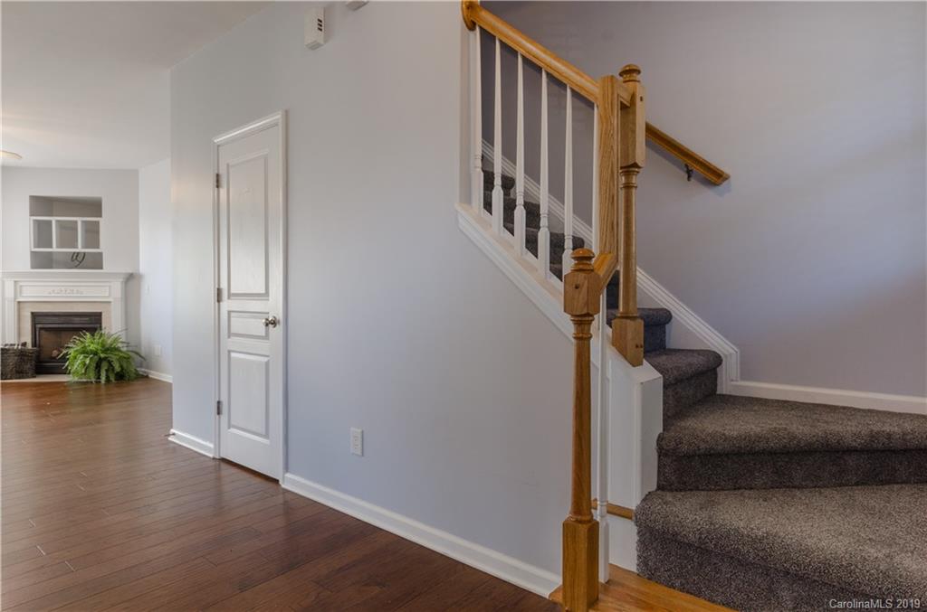 962 Copperstone Lane Fort Mill, SC 29708 - Photo 7 of 34 a view of entryway and hall with wooden floor