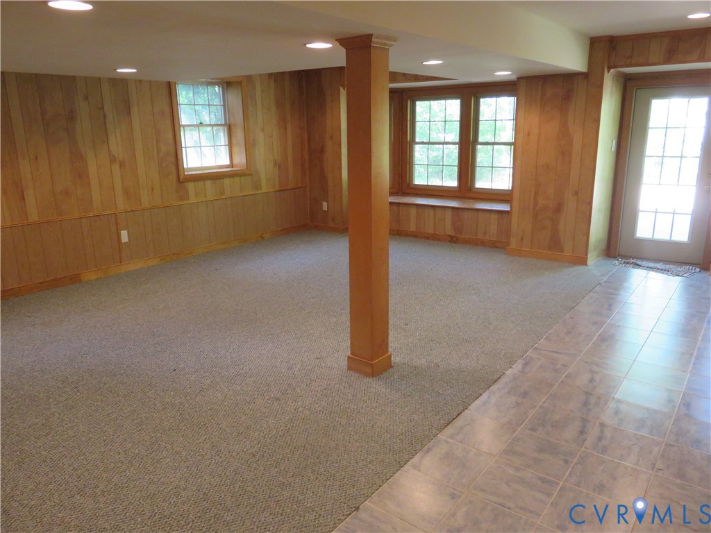 8379 Quailfield Road Mechanicsville, VA 23116 - Photo 46 of 56 an empty room with windows