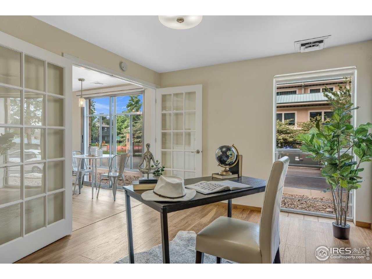 500 Mohawk Drive, Unit 103 Boulder, CO 80303 - Photo 11 of 28 a living room with furniture and a potted plant