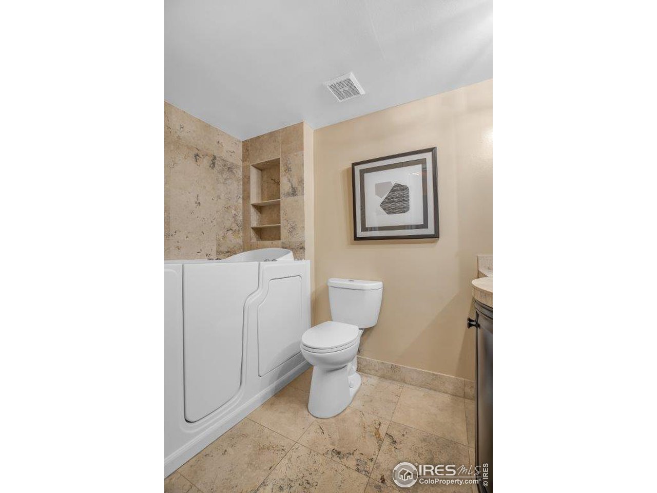 500 Mohawk Drive, Unit 103 Boulder, CO 80303 - Photo 16 of 28 a bathroom with a toilet a sink and mirror