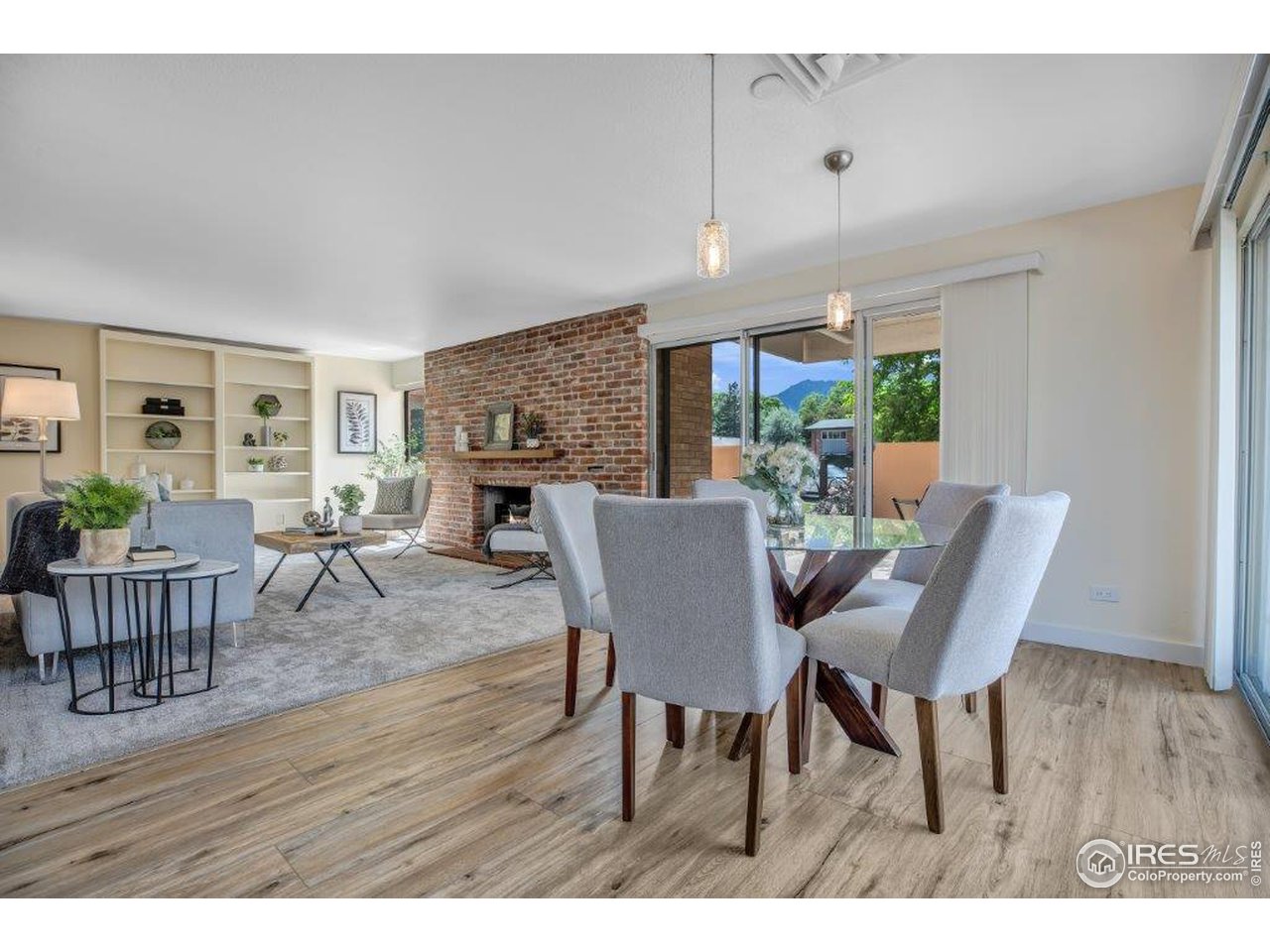 500 Mohawk Drive, Unit 103 Boulder, CO 80303 - Photo 2 of 28 a view of a dining room with furniture window and wooden floor
