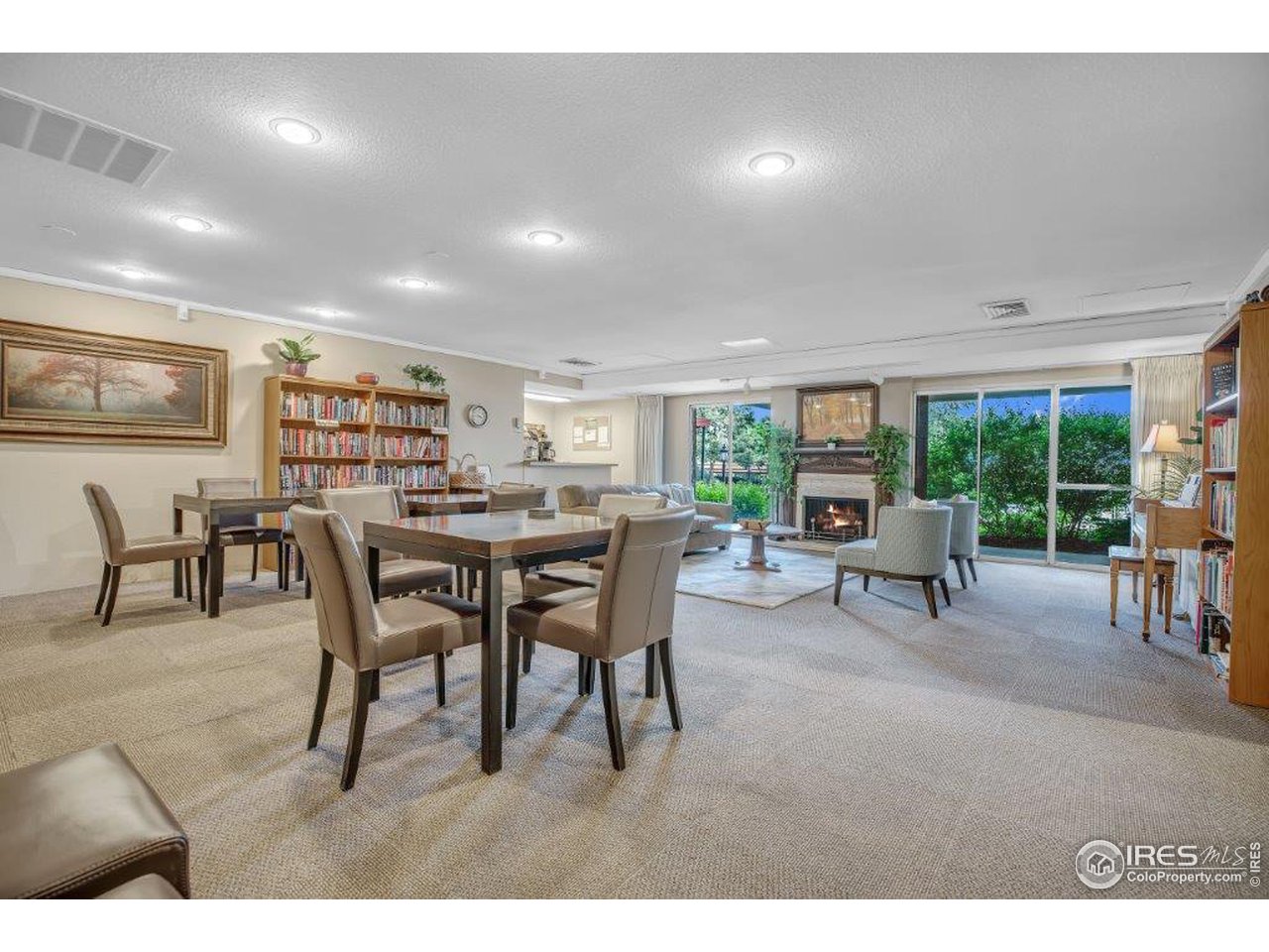 500 Mohawk Drive, Unit 103 Boulder, CO 80303 - Photo 21 of 28 a view of a dining area with furniture and a large window