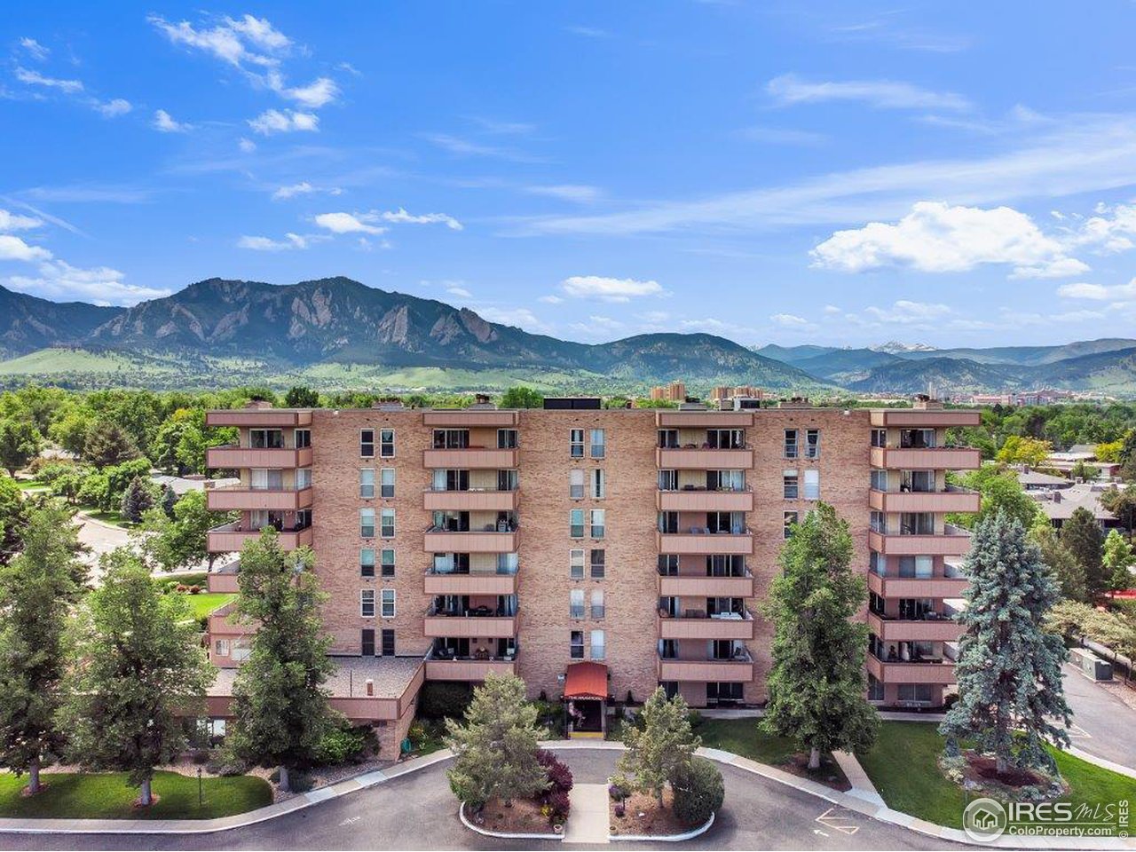 500 Mohawk Drive, Unit 103 Boulder, CO 80303 - Photo 26 of 28 a view of a city with tall buildings