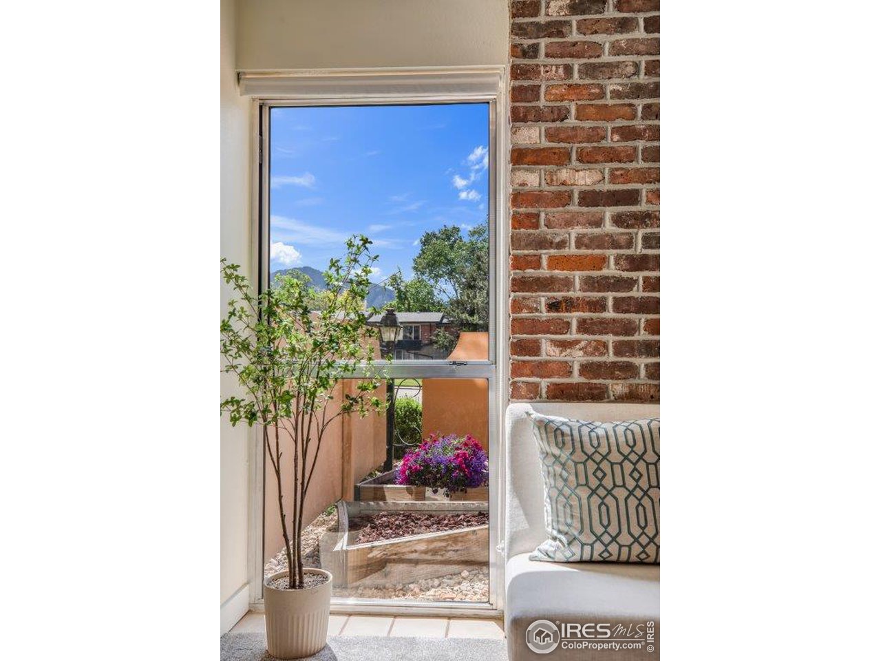 500 Mohawk Drive, Unit 103 Boulder, CO 80303 - Photo 4 of 28 a view of a door and chair