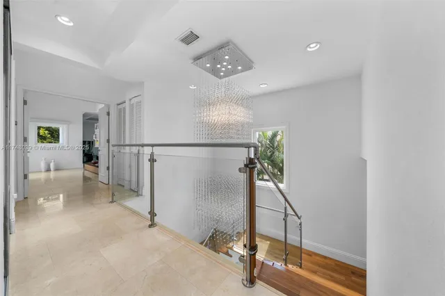 a view of a hallway with workspace