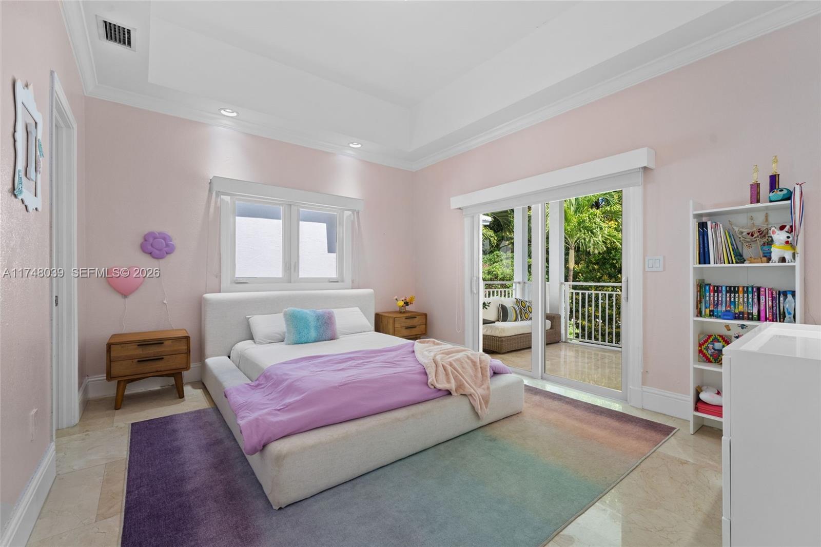 6 Coconut Lane Key Biscayne, FL 33149 - Photo 28 of 49 a bedroom with a bed wooden floor and a window