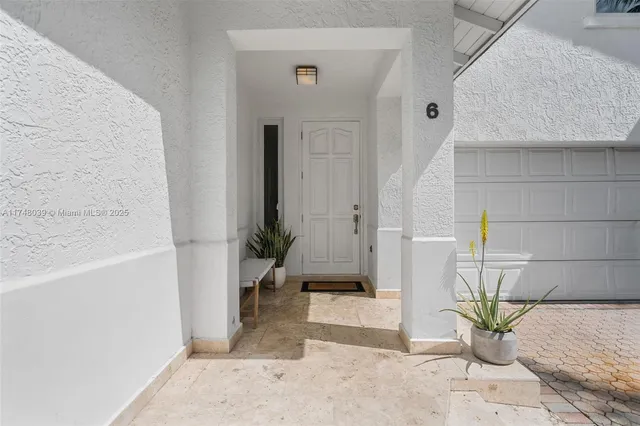 a view of balcony with a potted plant
