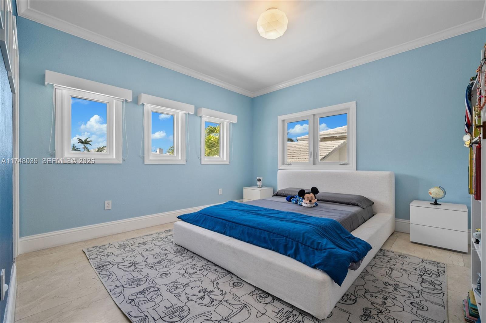 6 Coconut Lane Key Biscayne, FL 33149 - Photo 31 of 49 a bedroom with bed and a window