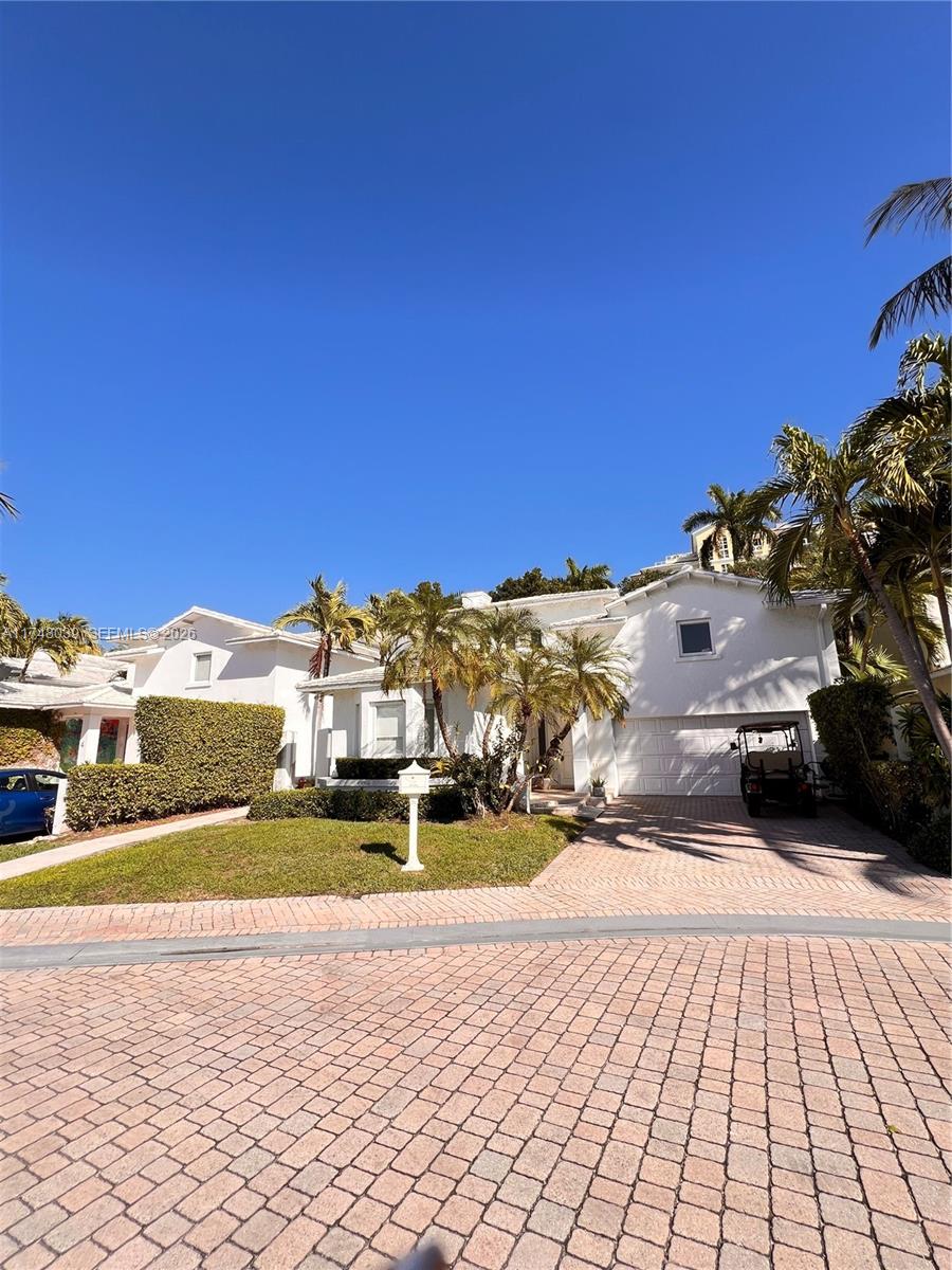 6 Coconut Lane Key Biscayne, FL 33149 - Photo 49 of 49 a view of a house with a ocean view