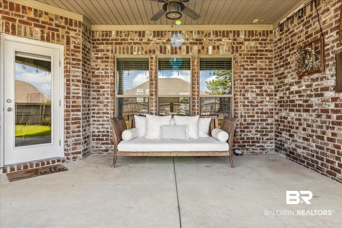 7088 Rocky Rd Loop Gulf Shores, AL 36542 - Photo 36 of 39 View of patio with a ceiling fan