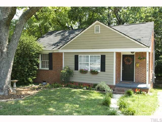 2112 Wake Forest Road Raleigh, NC 27608 - Photo 1 of 9 a front view of a house with garden