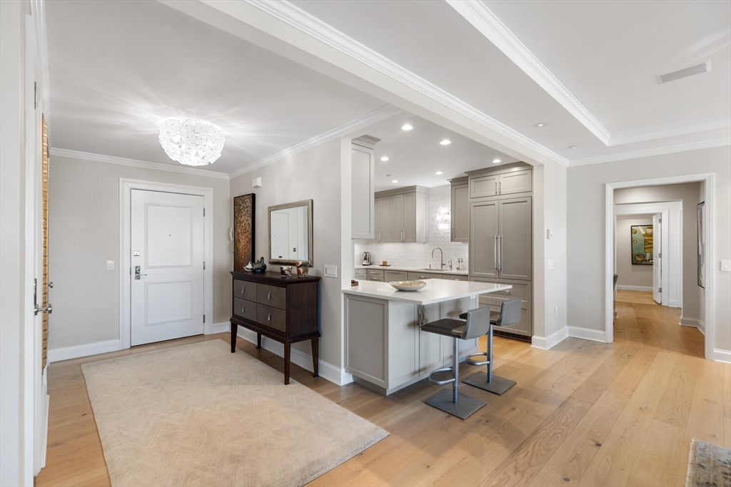 100 Belvidere Street, Unit 7A Boston, MA 02199 - Photo 15 of 40 a view of a room with kitchen and dining room