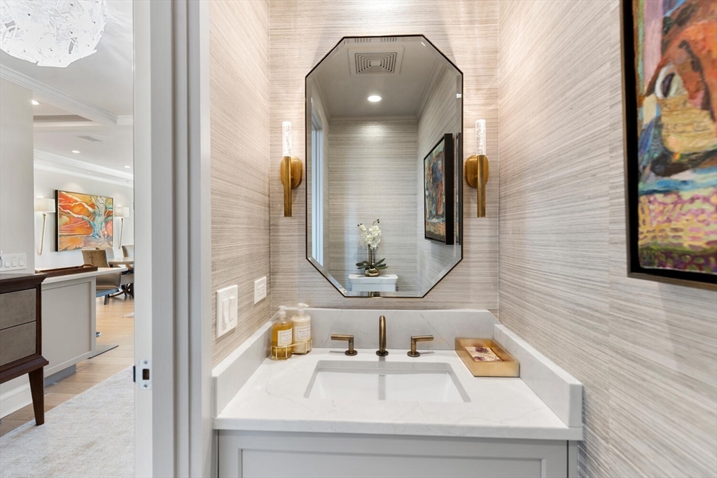 100 Belvidere Street, Unit 7A Boston, MA 02199 - Photo 18 of 40 a bathroom with a sink and a mirror