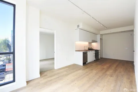 a view of a kitchen with a sink