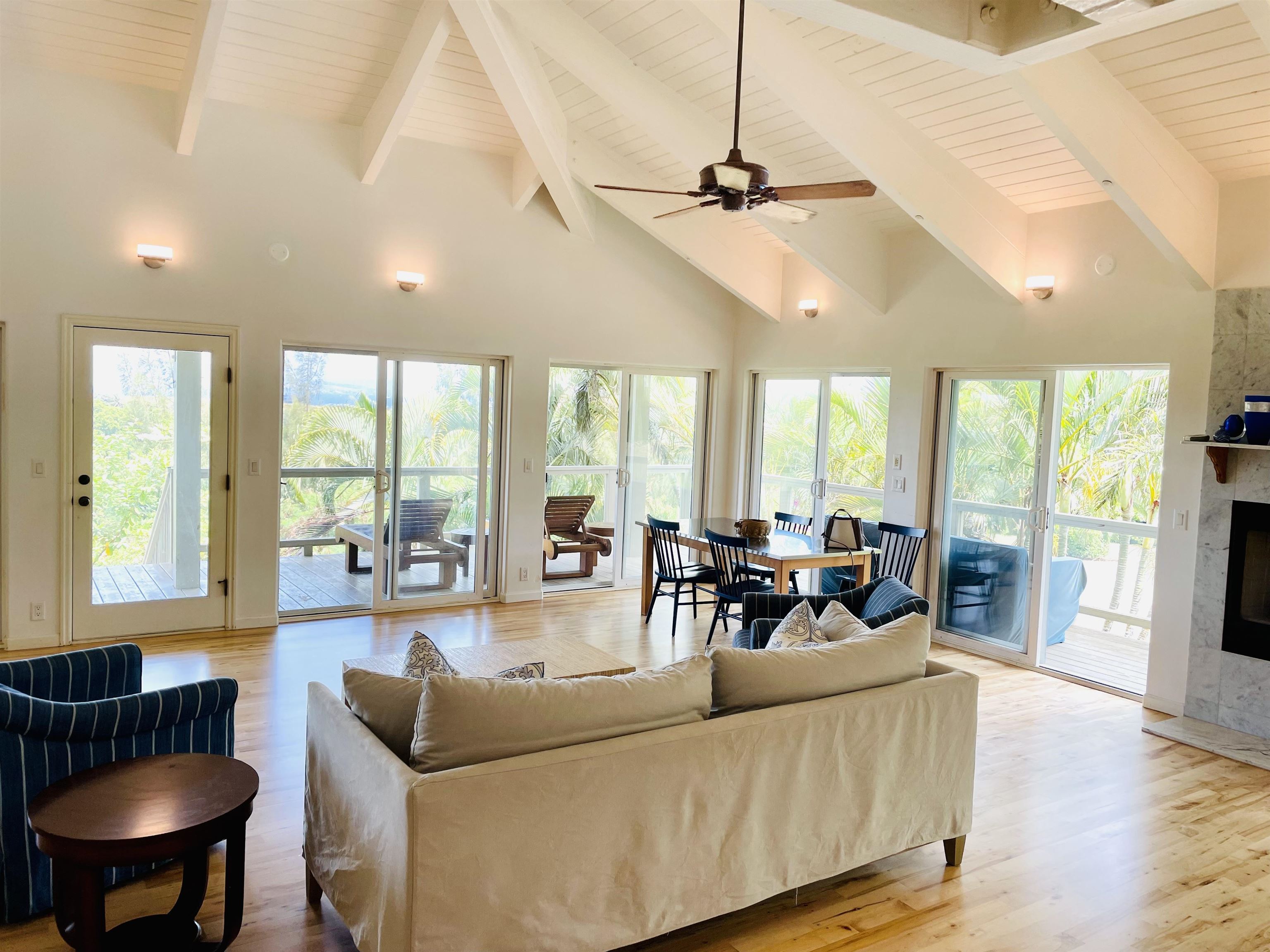 150 Piialii Place Haiku, HI 96708 - Photo 1 of 3 a living room with furniture and a large window