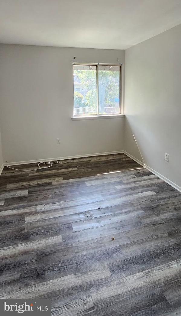 736 Myrtle Avenue Lindenwold, NJ 08021 - Photo 14 of 31 a view of empty room with window and wooden floor