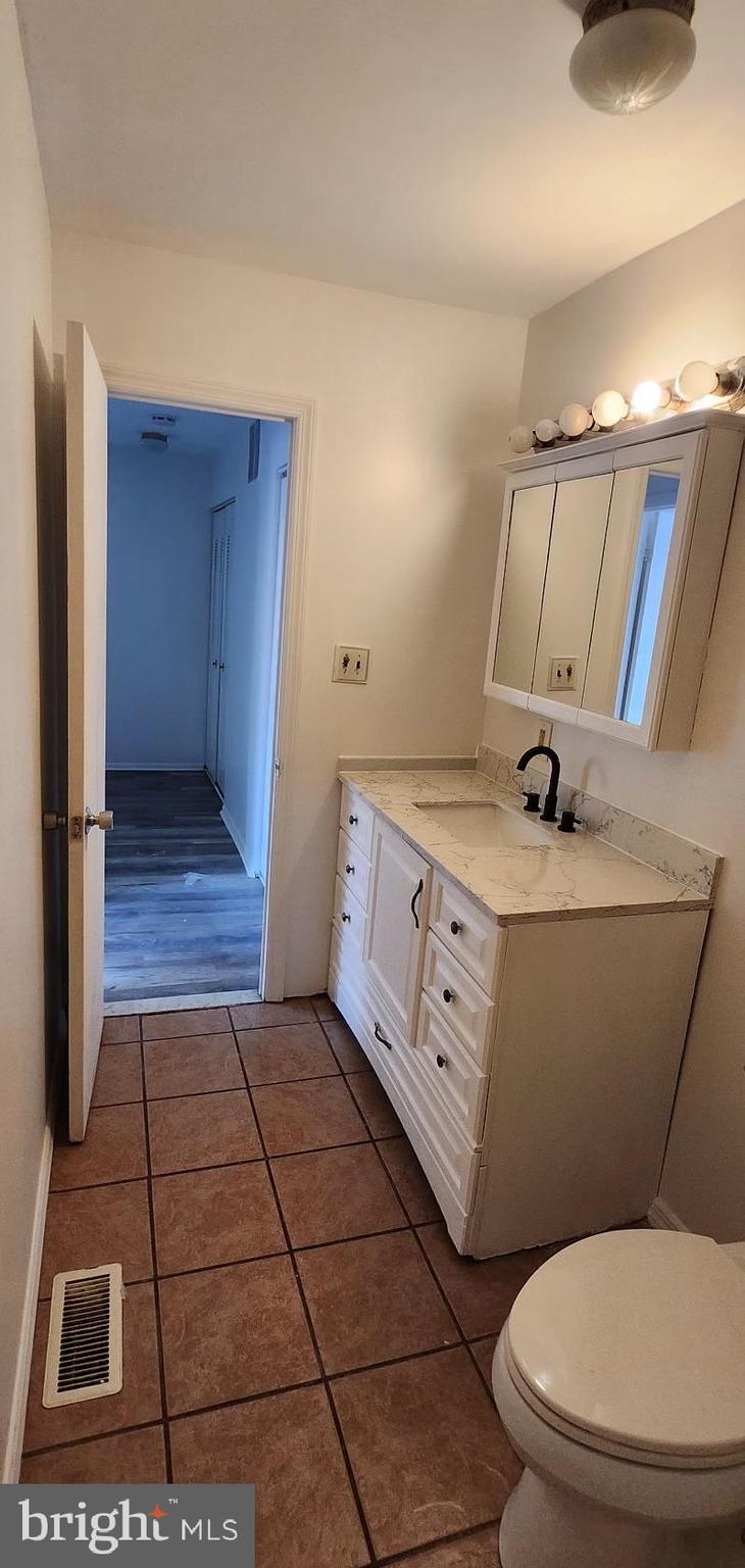 736 Myrtle Avenue Lindenwold, NJ 08021 - Photo 17 of 31 a bathroom with a sink and a toilet