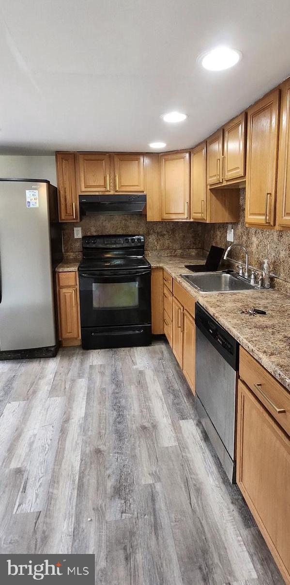 736 Myrtle Avenue Lindenwold, NJ 08021 - Photo 24 of 31 a kitchen with stainless steel appliances granite countertop a stove a sink and a refrigerator