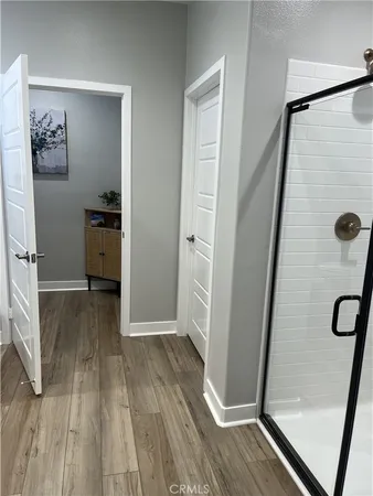 a view of entryway with wooden floor