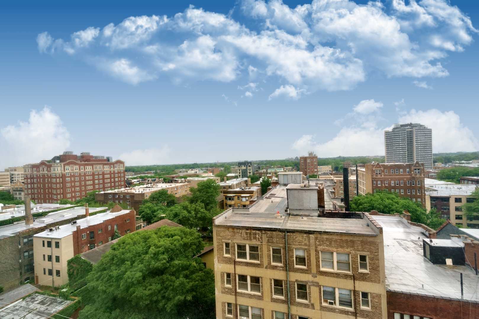 5740 North Sheridan Road, Unit 10D Chicago, IL 60660 - Photo 18 of 22 a view of a city with tall buildings