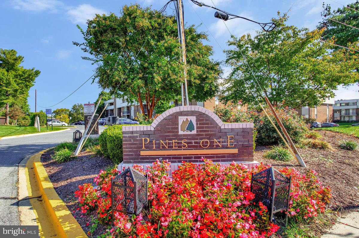 10216 Prince Place, Unit 9204 Upper Marlboro, MD 20774 - Photo 1 of 19 a front view of a house with a yard
