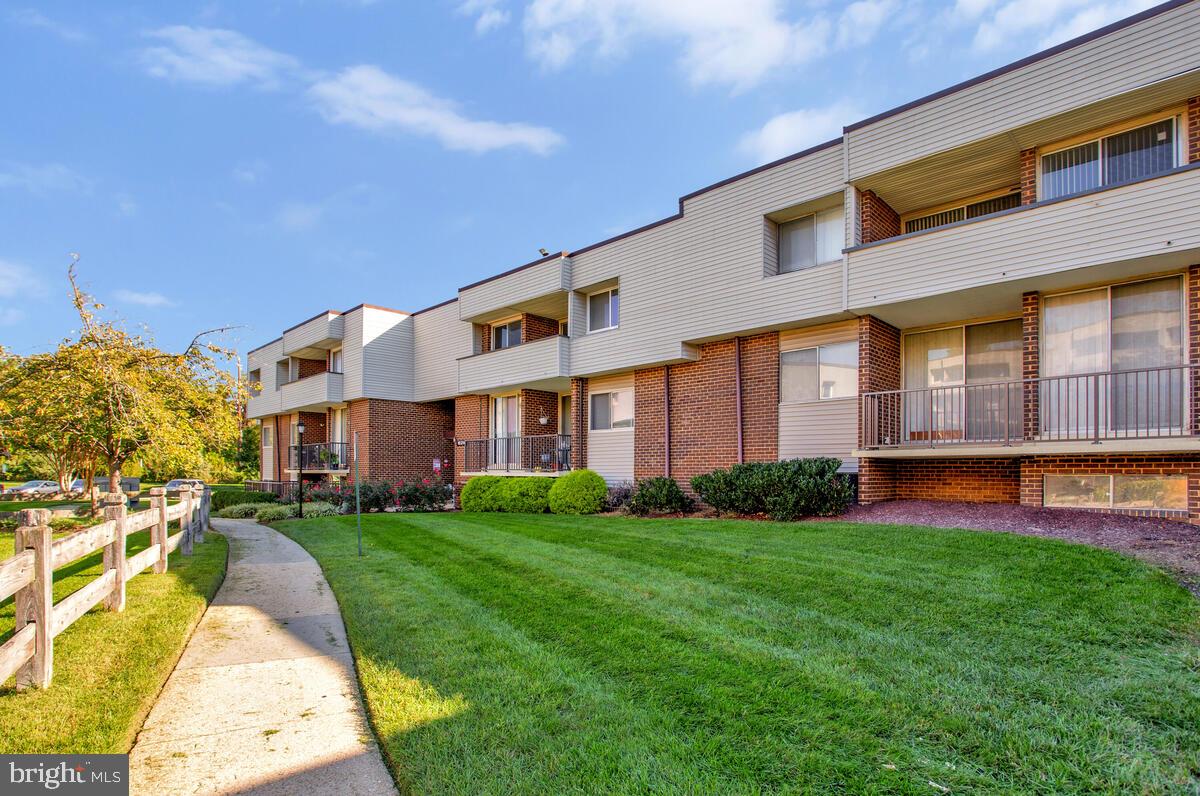 10216 Prince Place, Unit 9204 Upper Marlboro, MD 20774 - Photo 18 of 19 a view of a house with a swimming pool