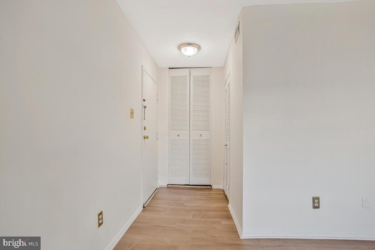 10216 Prince Place, Unit 9204 Upper Marlboro, MD 20774 - Photo 6 of 19 a view of a hallway