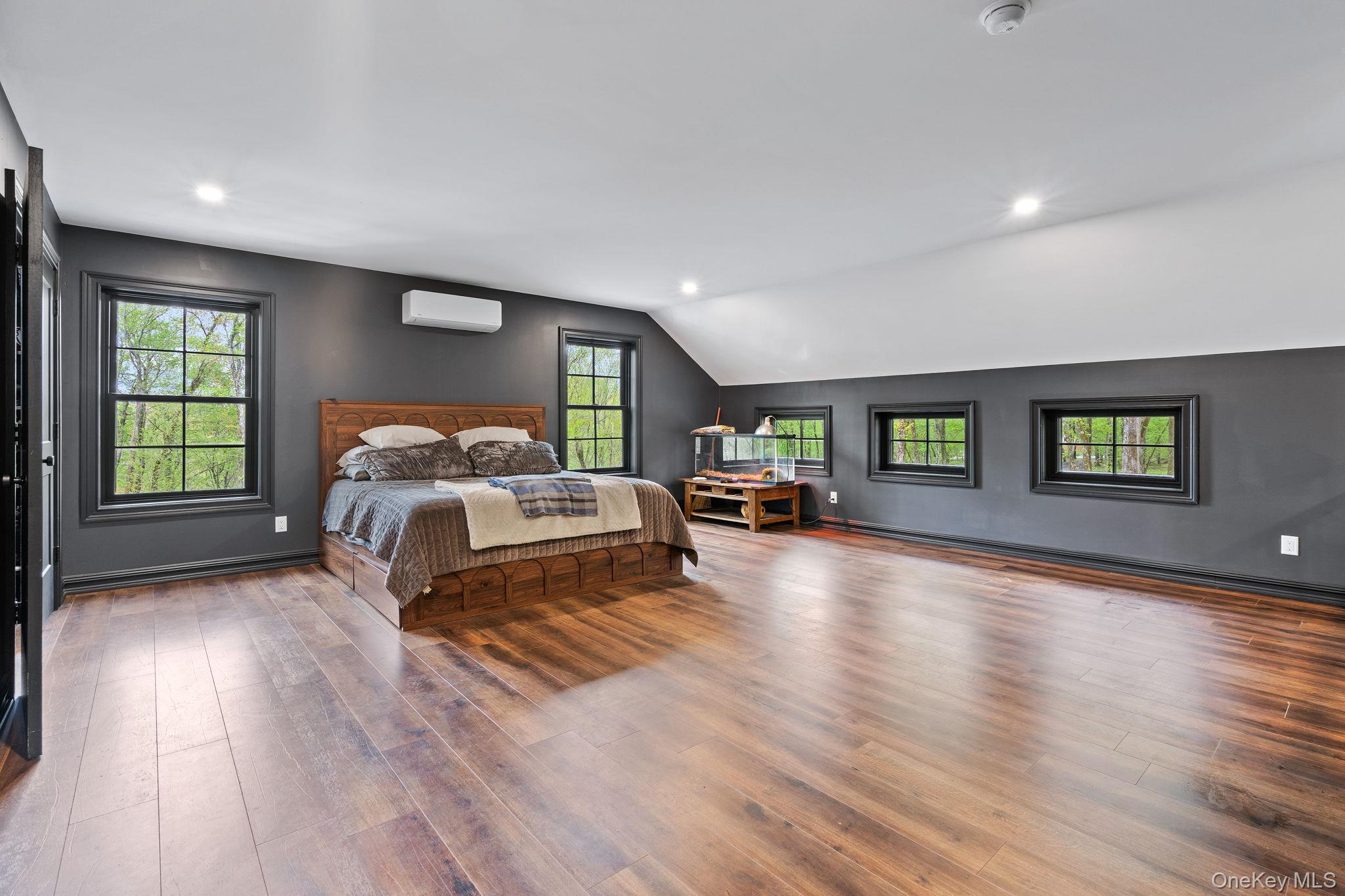 660 South Plank Road Newburgh, NY 12550 - Photo 15 of 50 a bedroom with furniture and a wooden floor