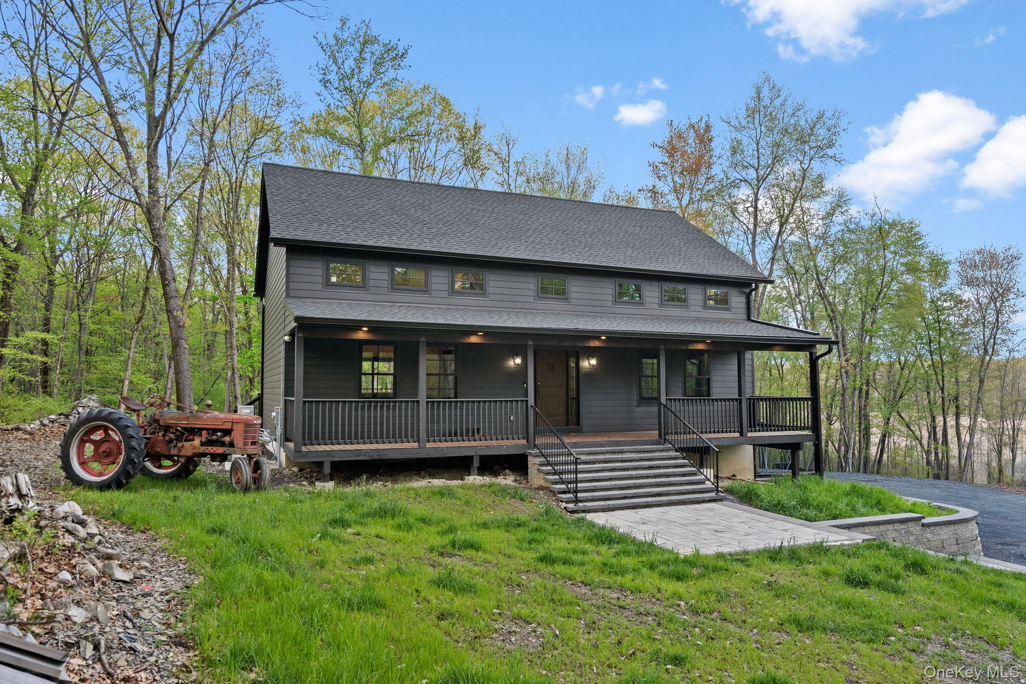 660 South Plank Road Newburgh, NY 12550 - Photo 2 of 50 a front view of a house with garden