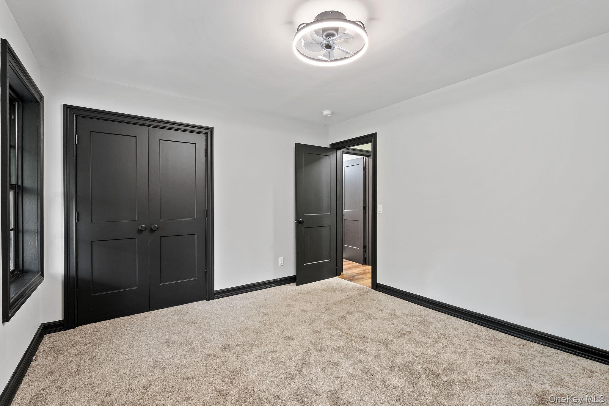 660 South Plank Road Newburgh, NY 12550 - Photo 25 of 50 a big room with closet and mirror