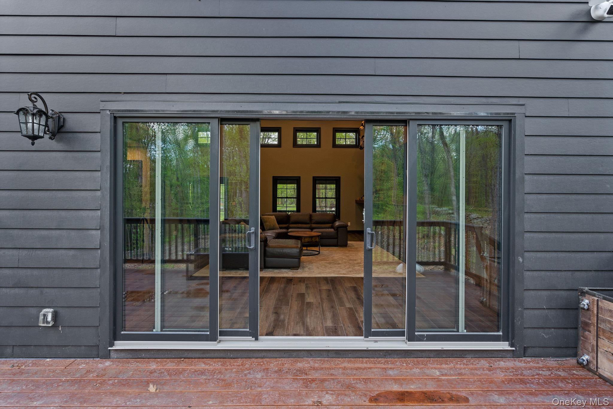 660 South Plank Road Newburgh, NY 12550 - Photo 44 of 50 a view of a porch with wooden floor and roof