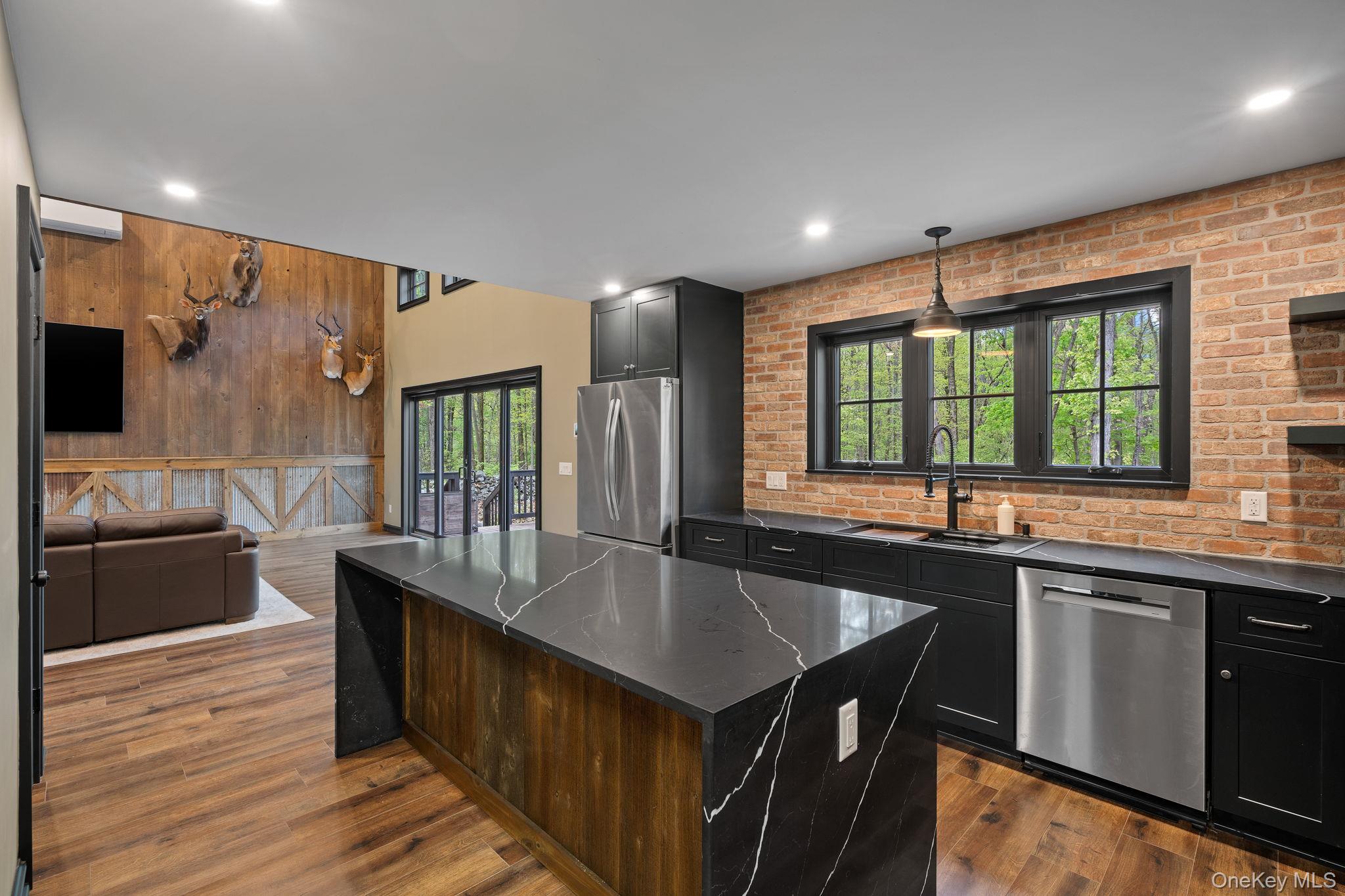 660 South Plank Road Newburgh, NY 12550 - Photo 5 of 50 a kitchen with counter top space sink and center island