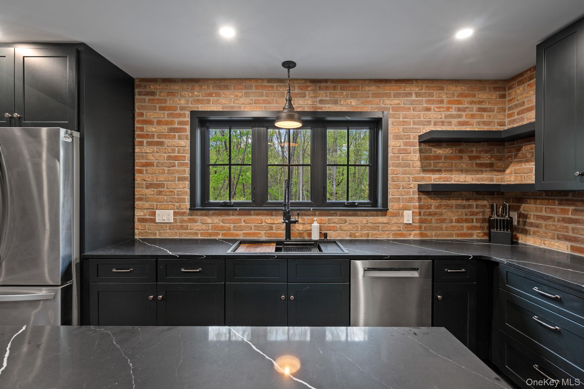660 South Plank Road Newburgh, NY 12550 - Photo 8 of 50 a kitchen with a sink and refrigerator