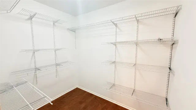 a view of a room with racks on the wall