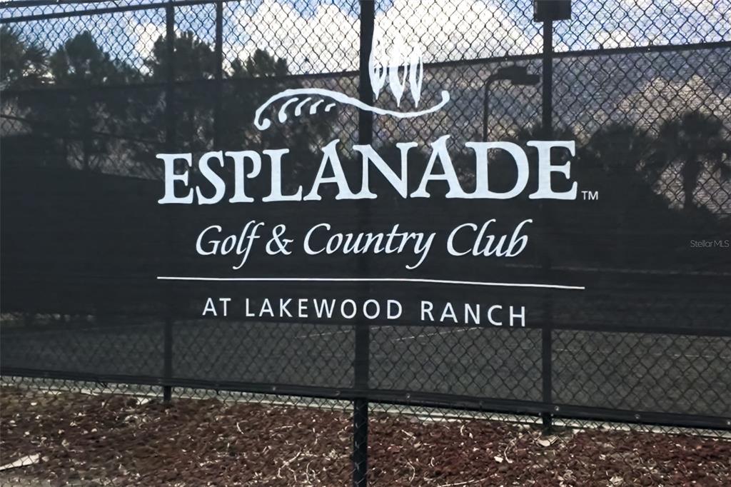 13725 Messina Loop, Unit 104 Bradenton, FL 34211 - Photo 52 of 77 a view of outdoor space with sign board