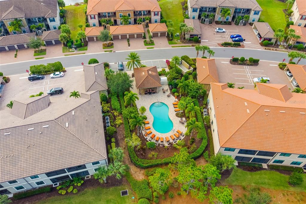 13725 Messina Loop, Unit 104 Bradenton, FL 34211 - Photo 63 of 77 an aerial view of a house with a swimming pool