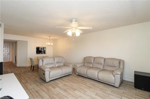 a living room with furniture and a couch