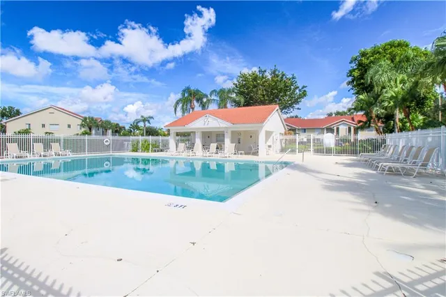 a view of house with outdoor space and sitting area