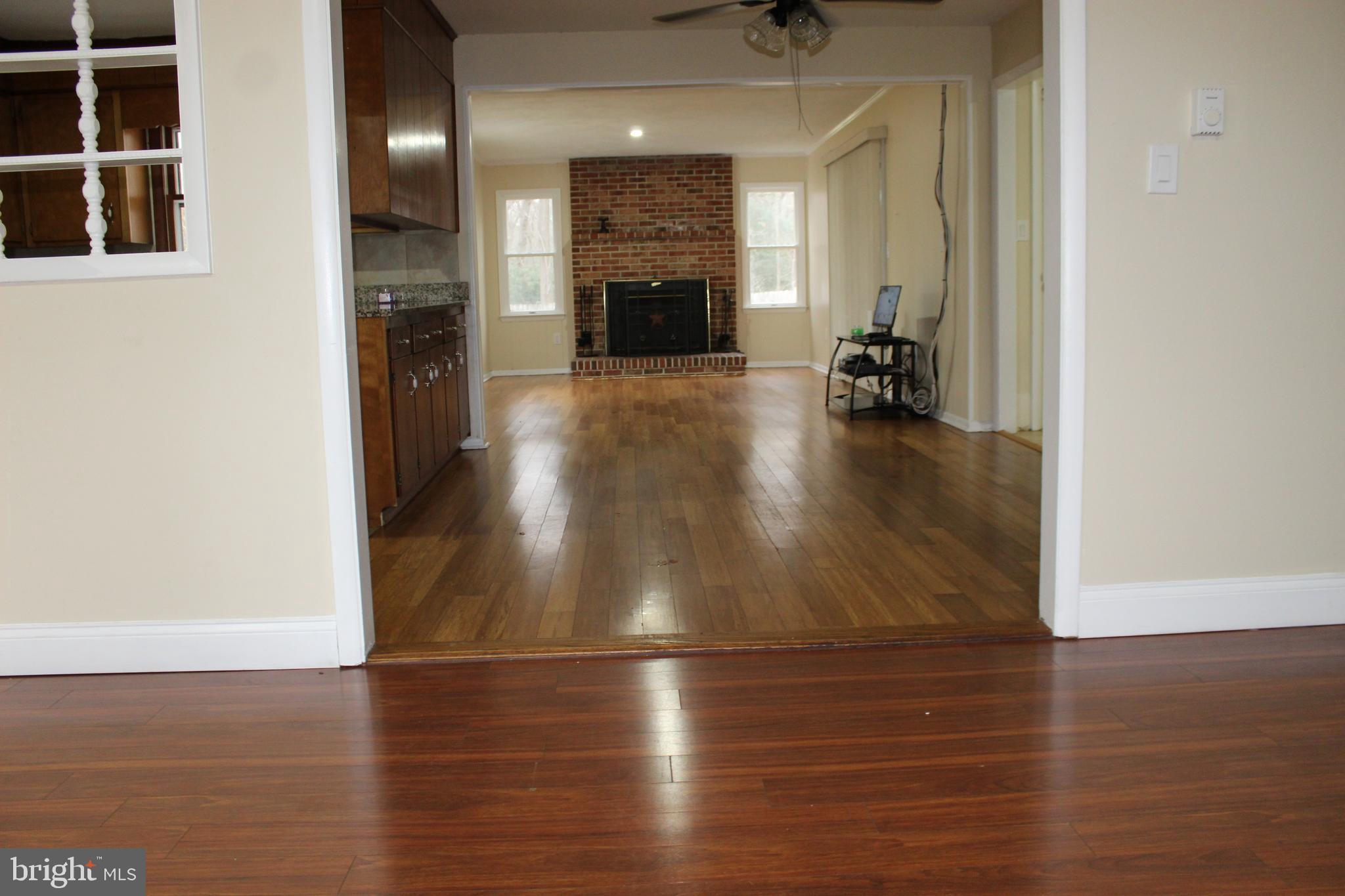 6604 Old Shawnee Road Milford, DE 19963 - Photo 6 of 29 Living Room looking into Dinning Area/Family Room
