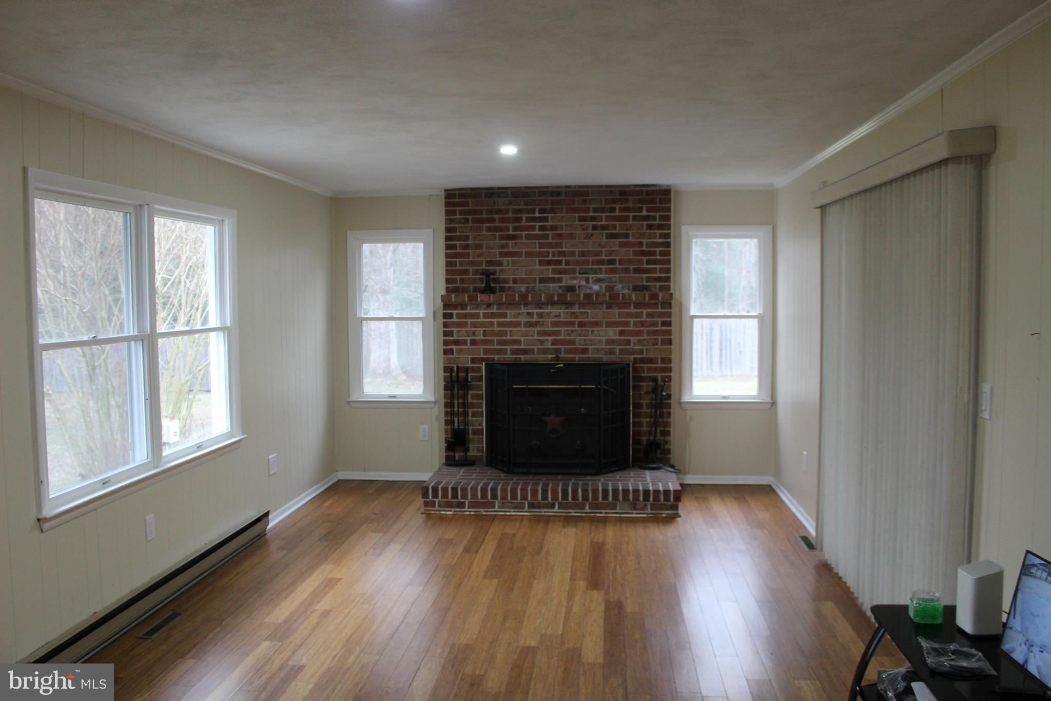 6604 Old Shawnee Road Milford, DE 19963 - Photo 7 of 29 Family Room with Wood Burning Fireplace